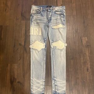 AMIRI Light Blue Distressed Skinny Jeans